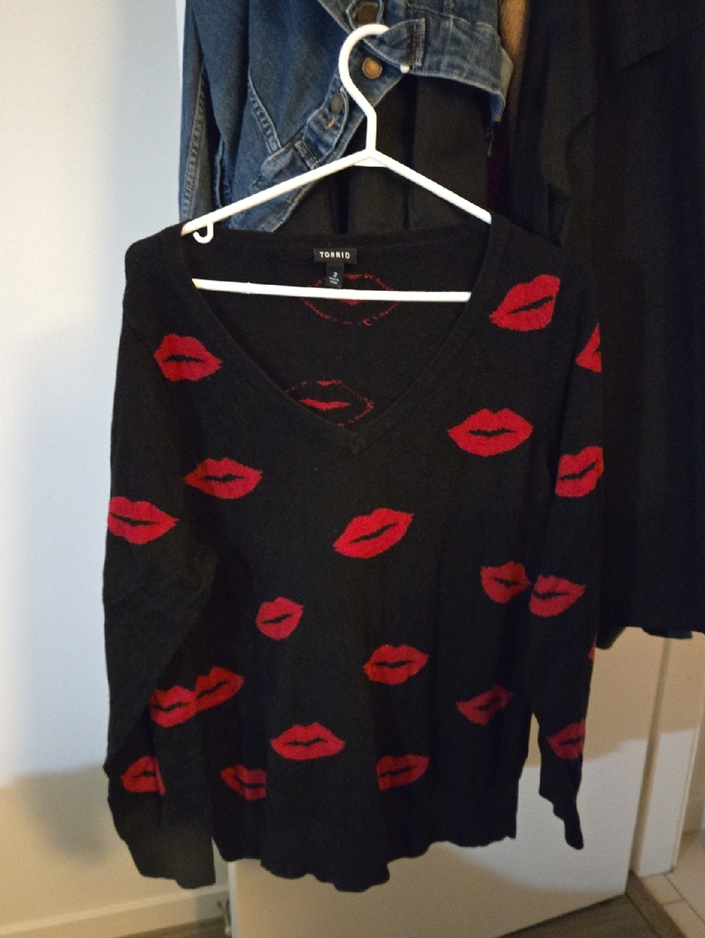 torrid Black V‑Neck Sweater with Red Lip Motif